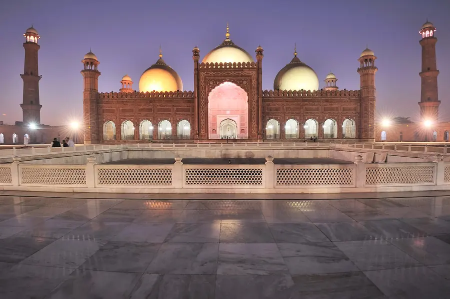 Badshahi Mosque in Lahore illuminated at dusk